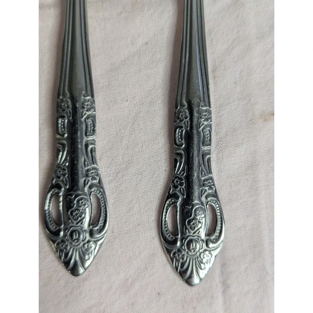 7 lot H.F. LTD Stainless stamped flower pattern 7